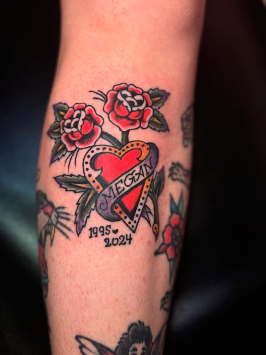 Colorful heart tattoo honoring Megan's memory