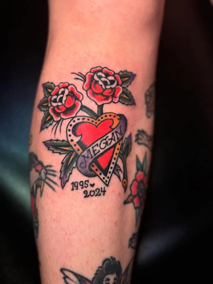 Colorful heart tattoo honoring Megan's memory