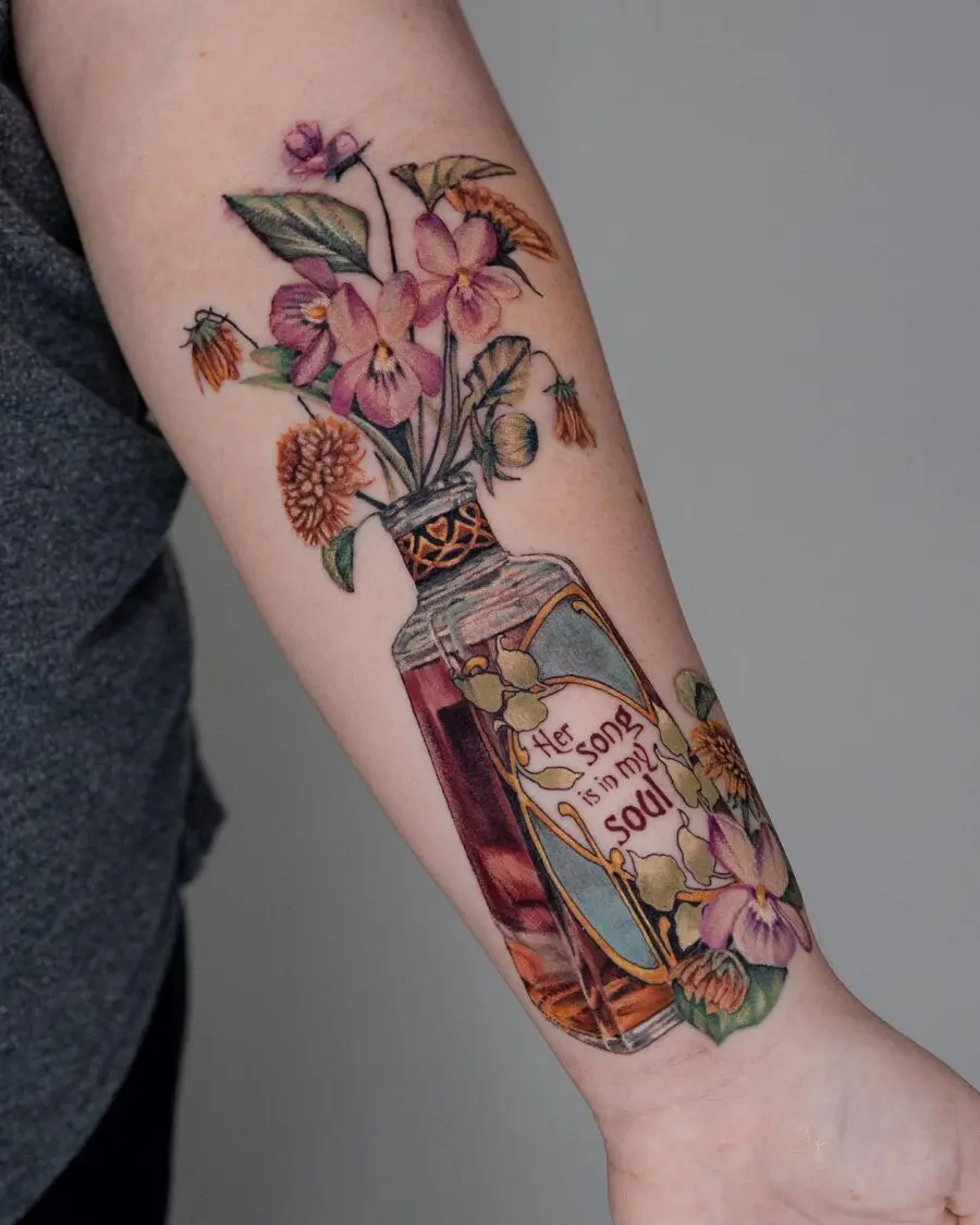 Colorful flower vase memorial tattoo for loved ones