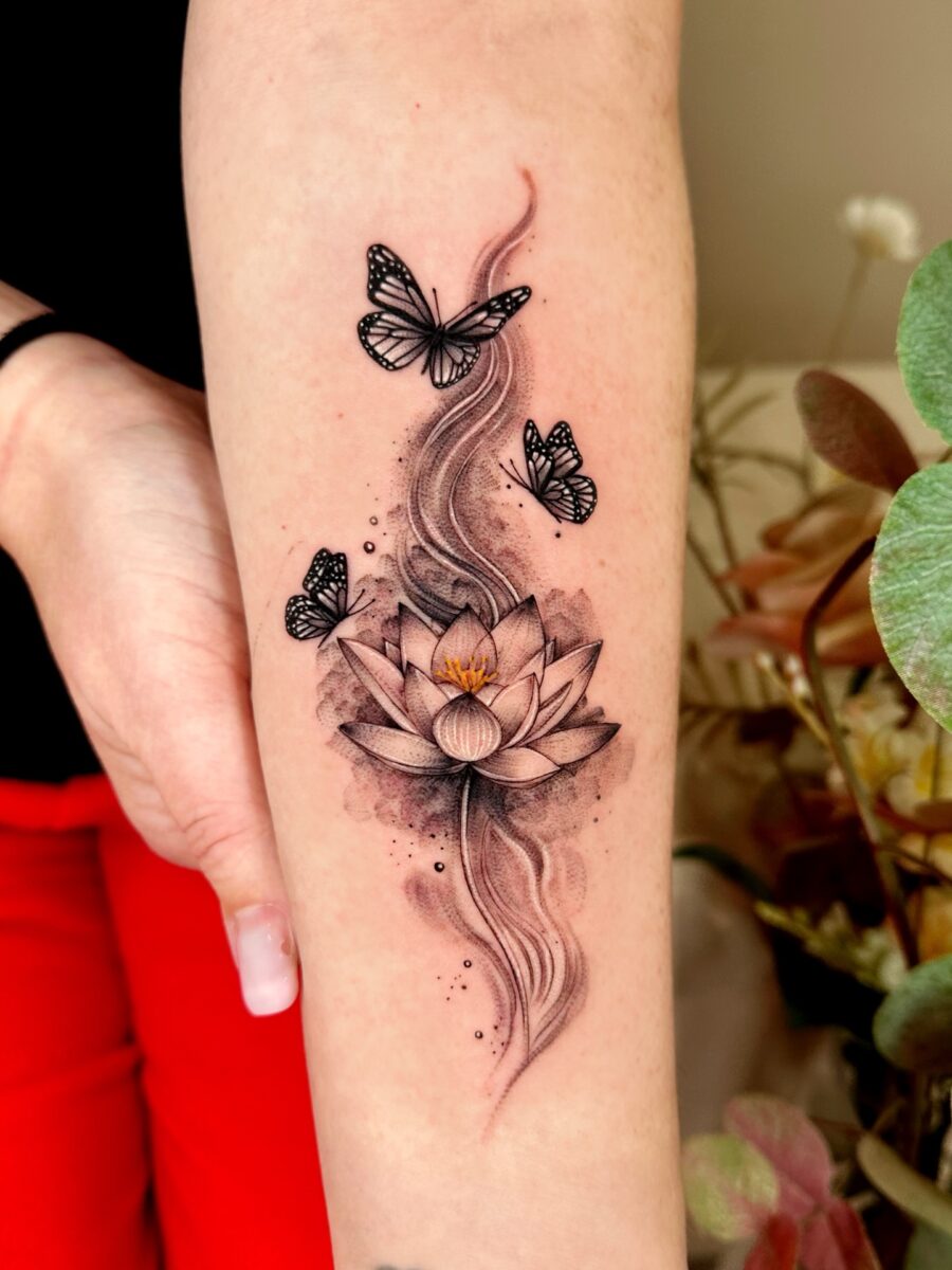 Symbolic floral tattoo with ethereal butterflies