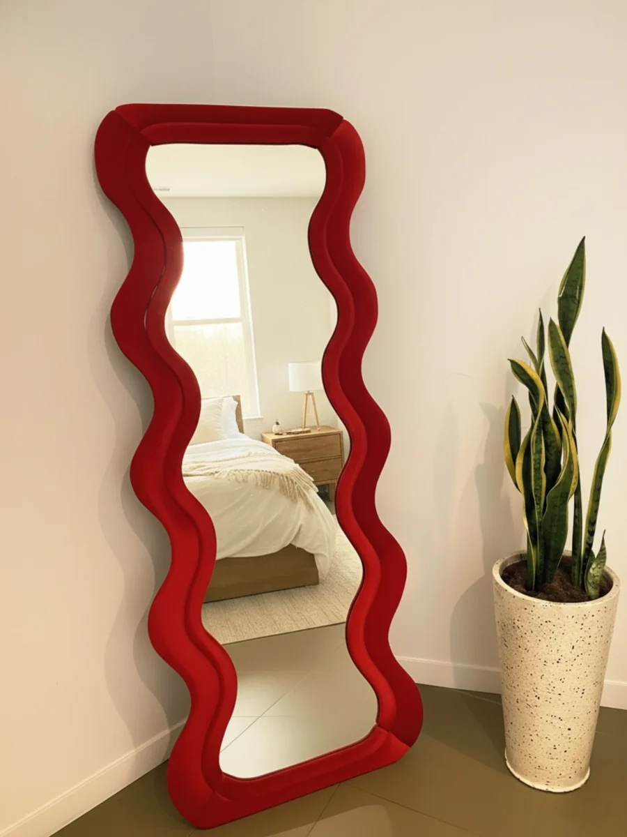 Unique Red Wavy Mirror Reflects Stylish Vibes