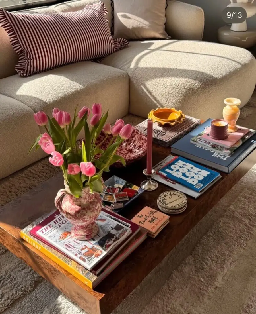 Chic coffee table with flowers and books