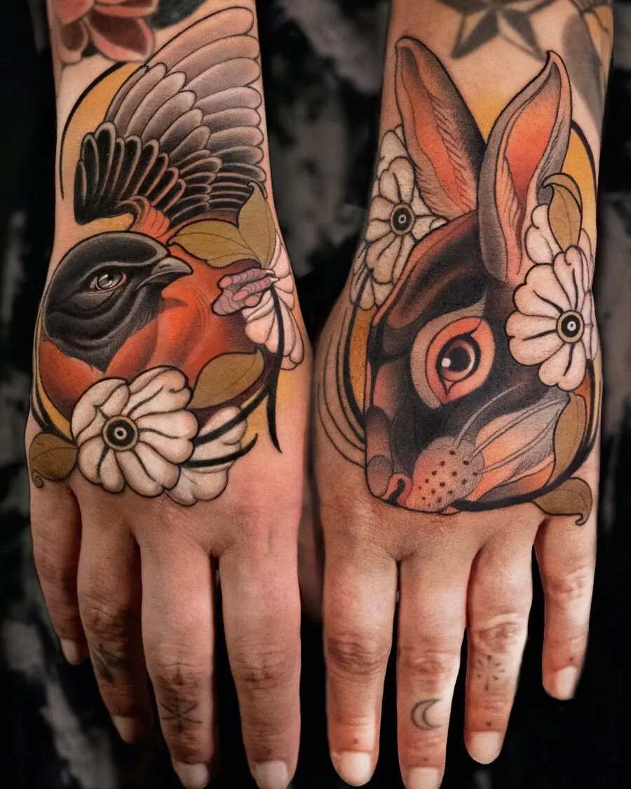 Vibrant neo-traditional tattoo featuring a bird and rabbit