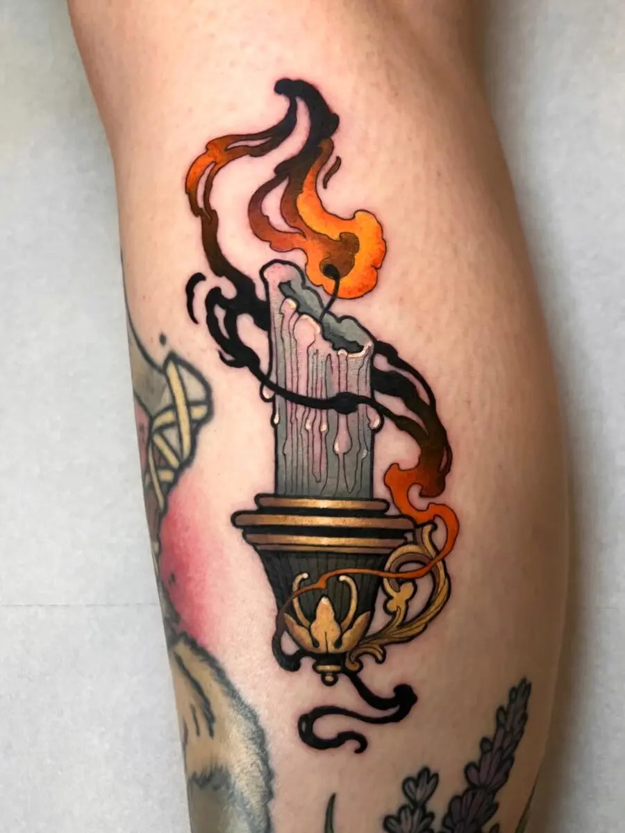 Bold candle tattoo with vibrant flame details
