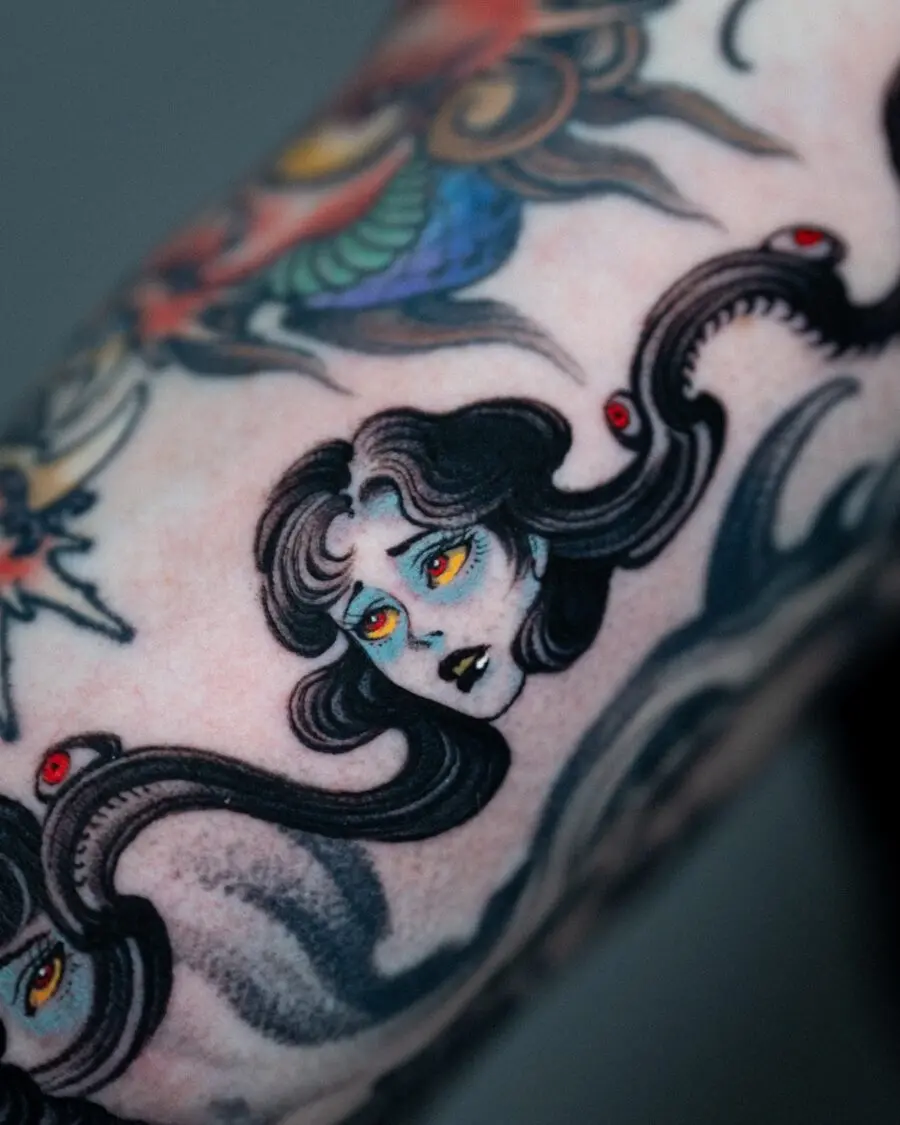 Intricate neo-traditional octopus lady tattoo