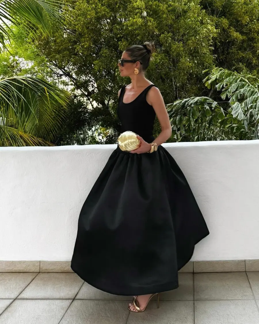 Elegant black outfit for New Year's Eve celebration
