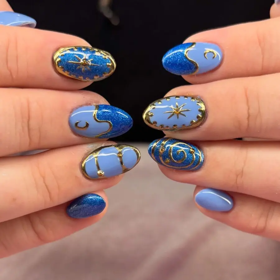 Elegant blue and gold New Year's nail art