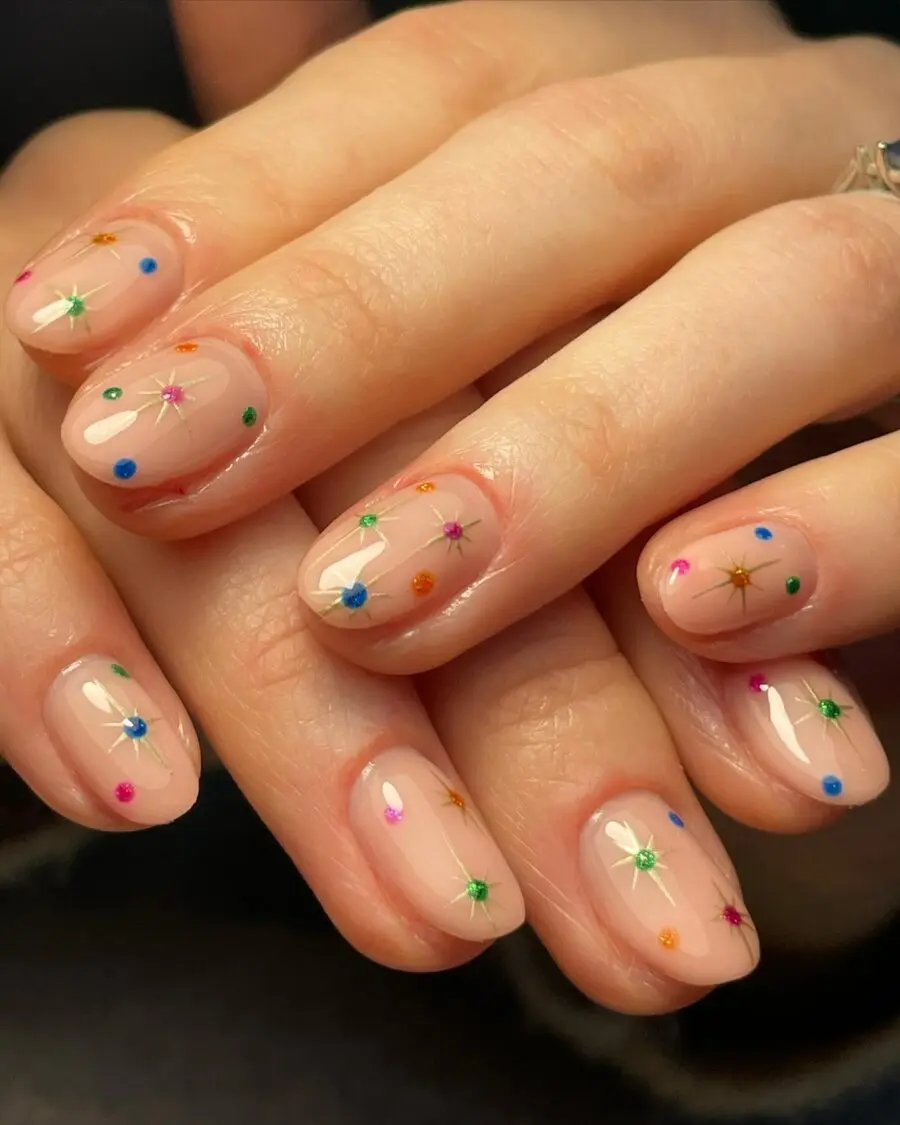 Festive nails with colorful star designs