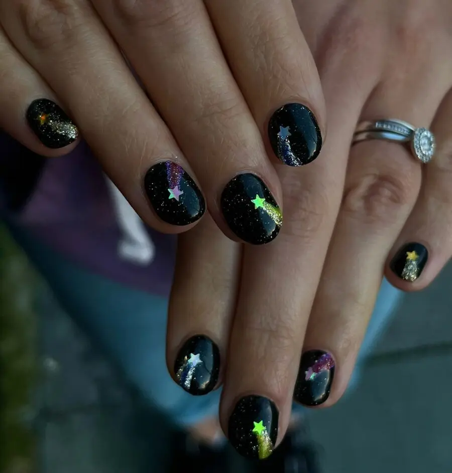 Stunning Black Nails with Glittering Star Accents