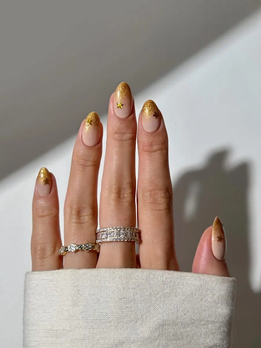 Festive gold glitter French tips for celebrations