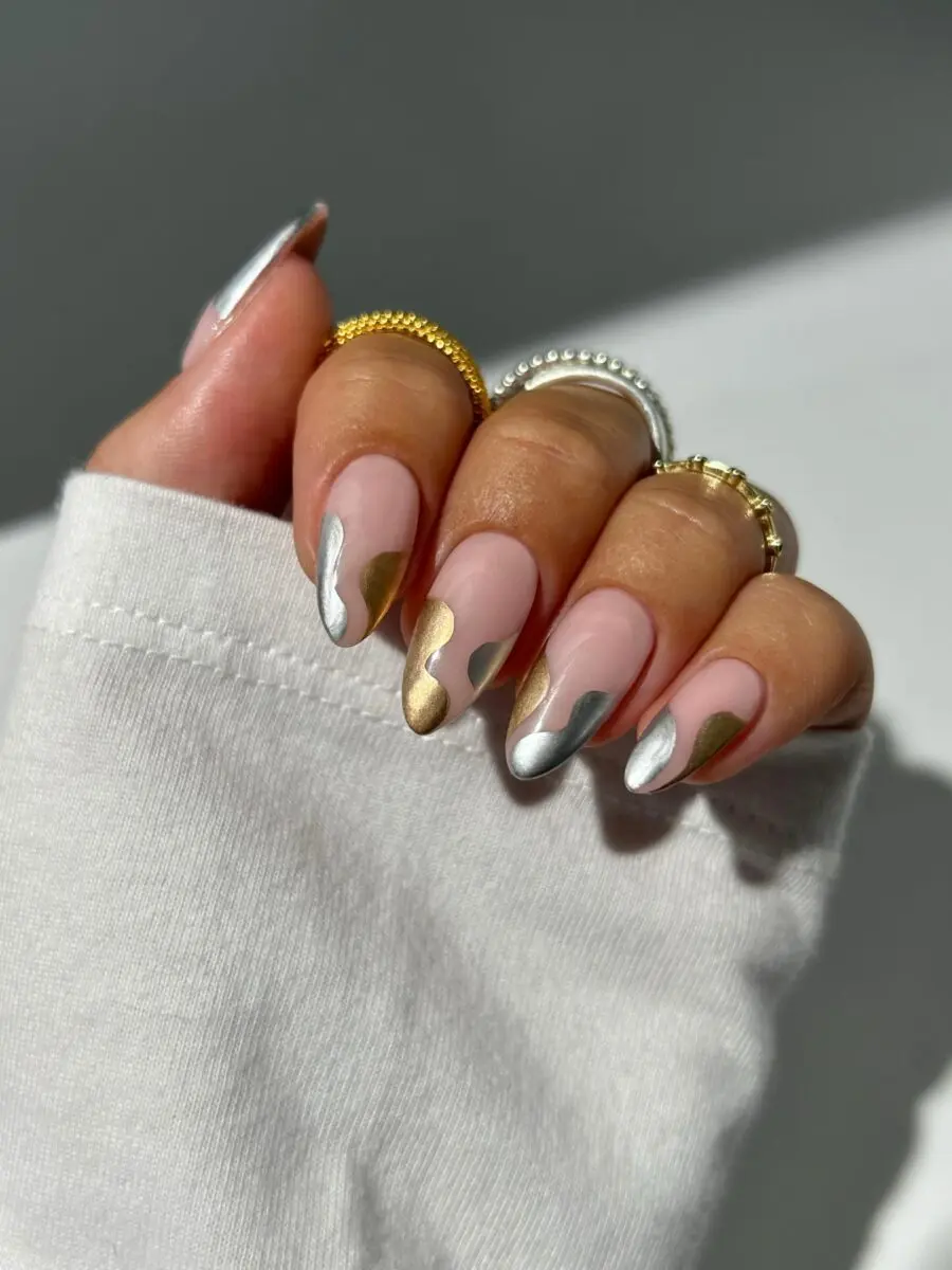 Elegant nails with golden and silver accents