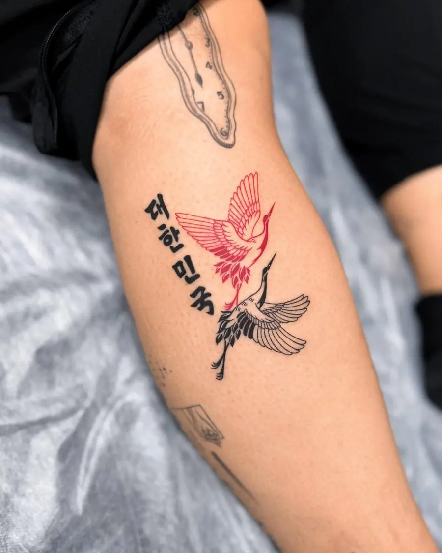 Stunning red ink bird tattoo design
