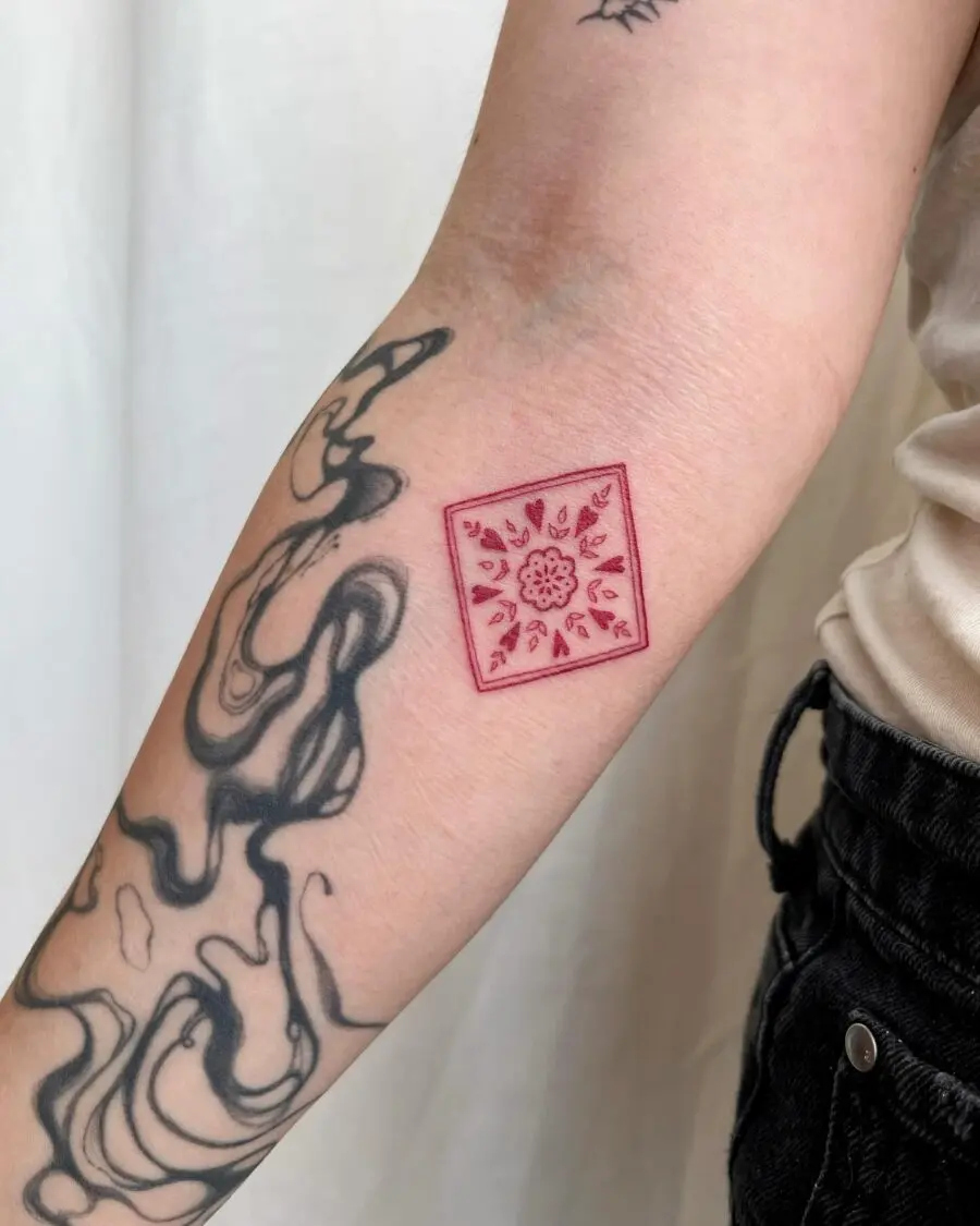 Elegant red ink floral square tattoo design