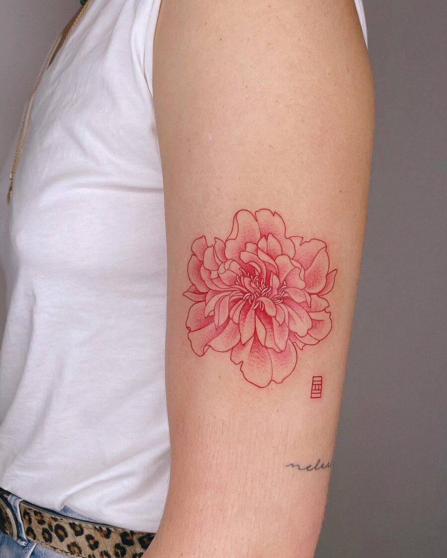 Bold Red Ink Flower Tattoo on Arm