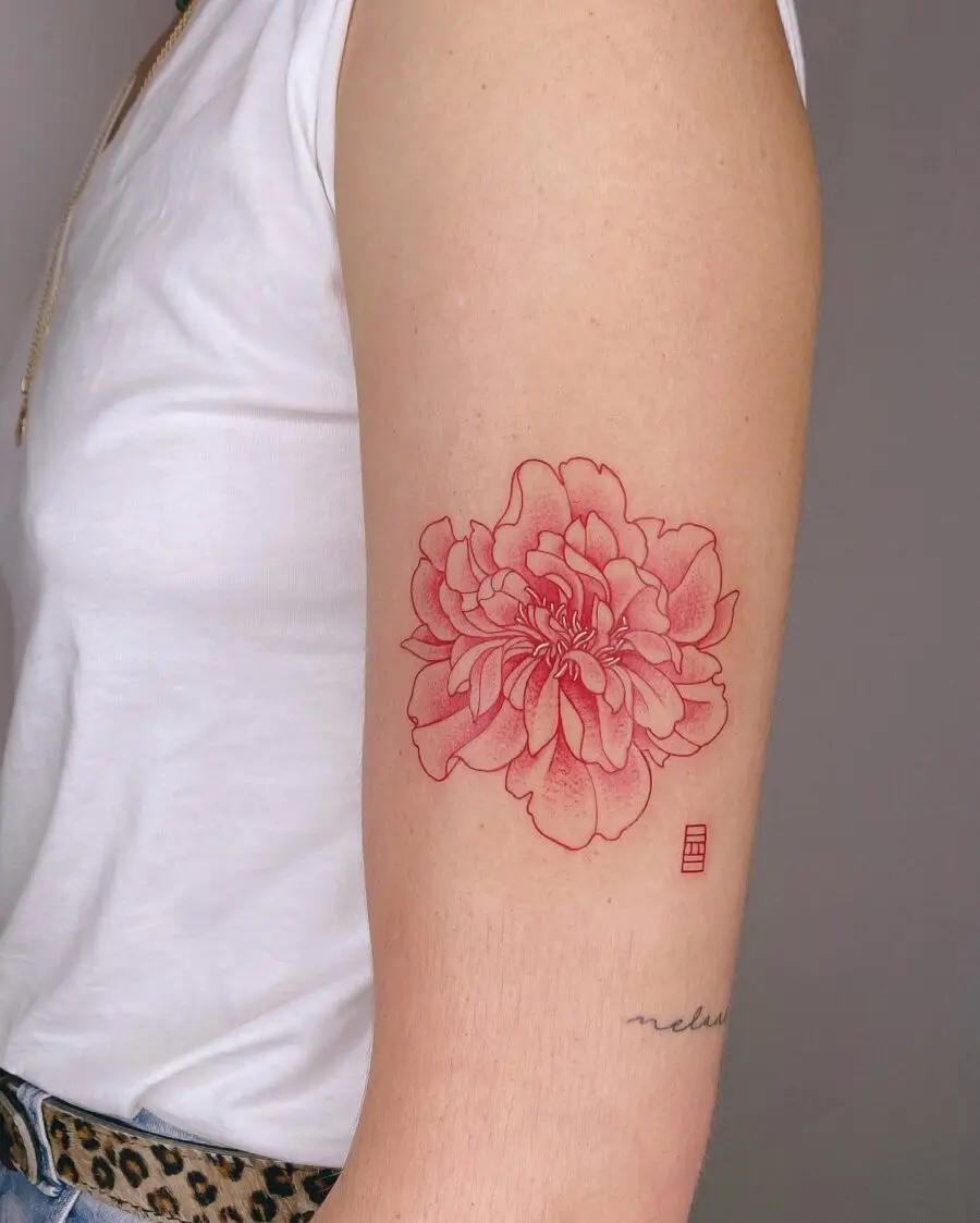 Bold Red Ink Flower Tattoo on Arm