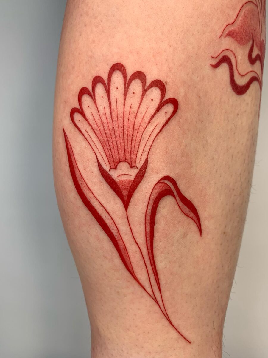 Stunning red ink floral tattoo design