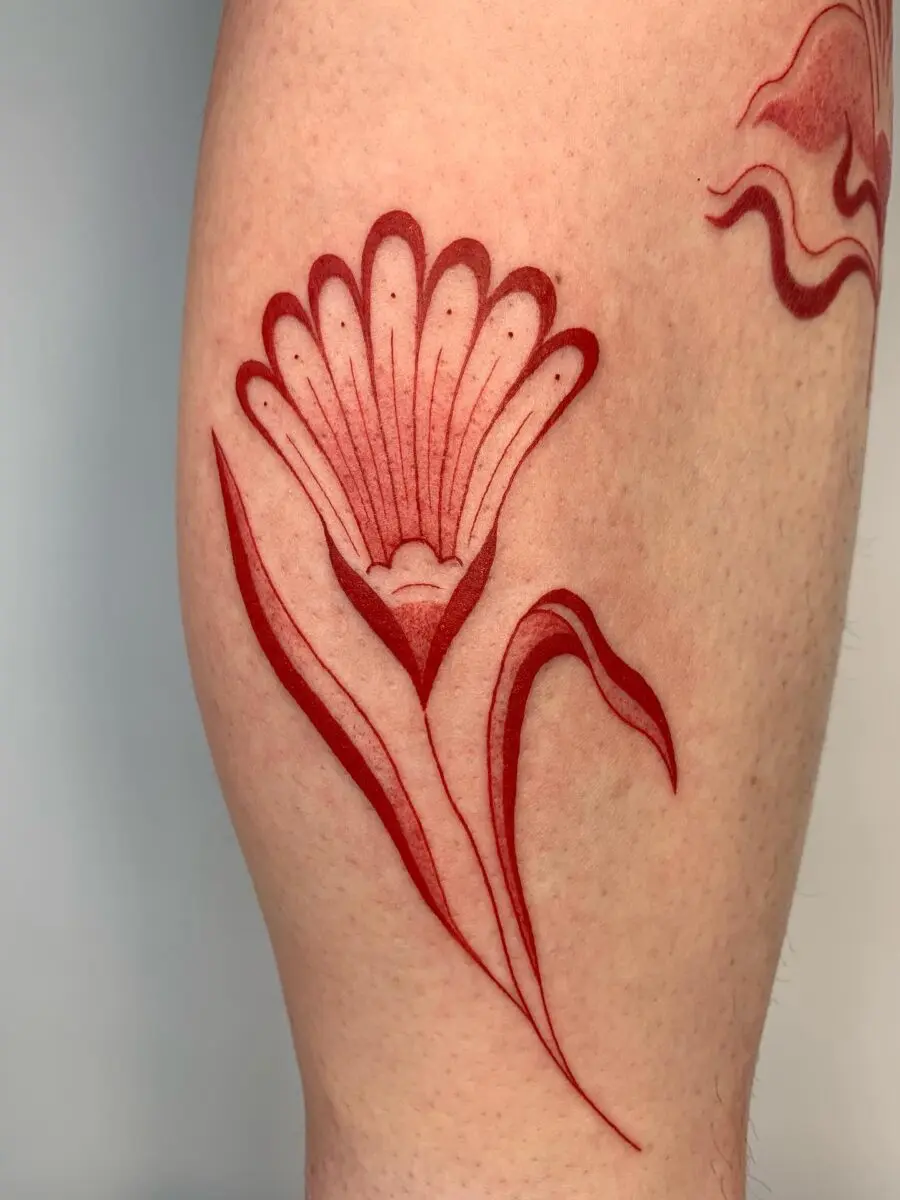 Stunning red ink floral tattoo design