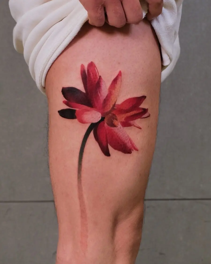 Stunning red flower tattoo bringing life.