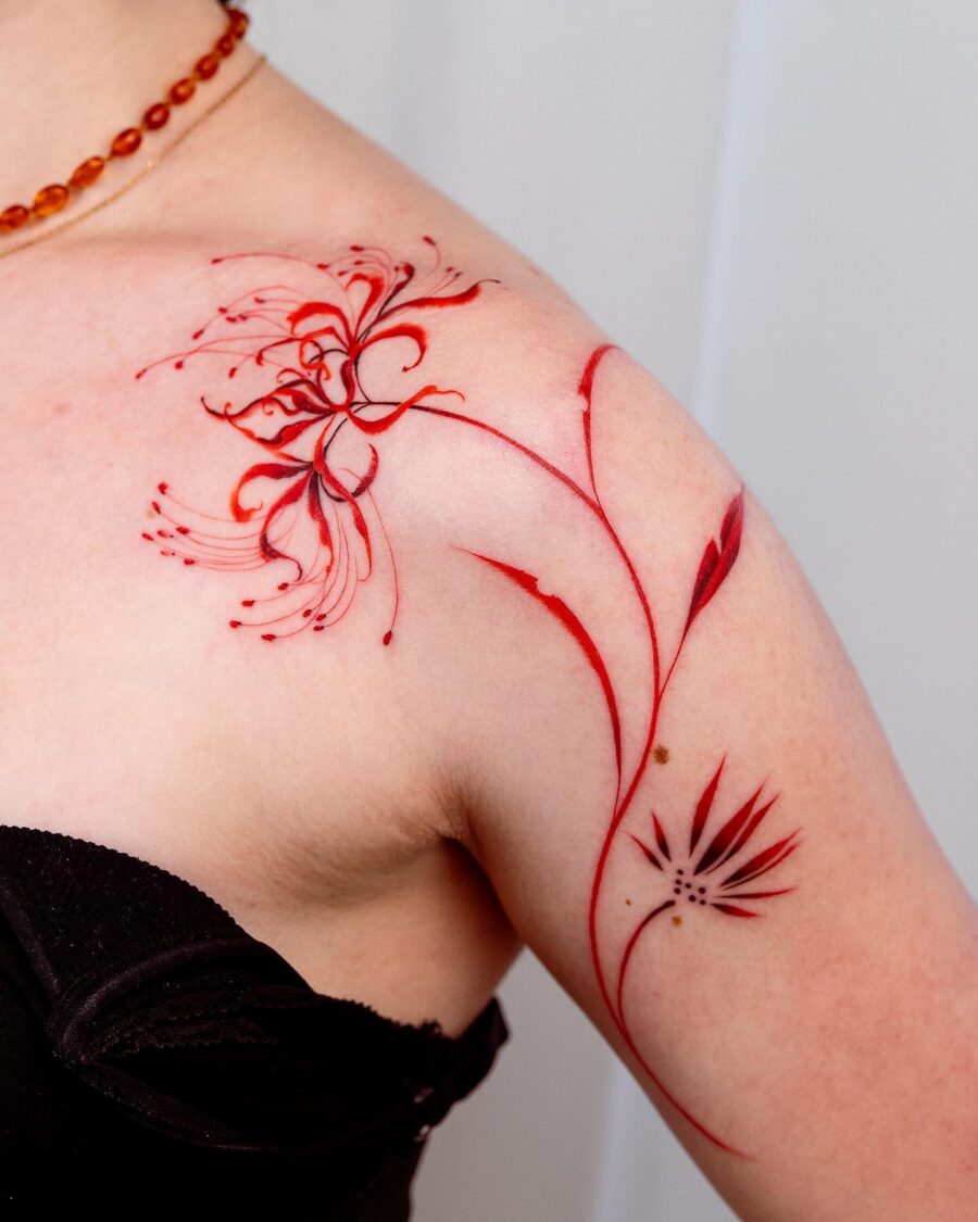 Elegant red floral design on shoulder