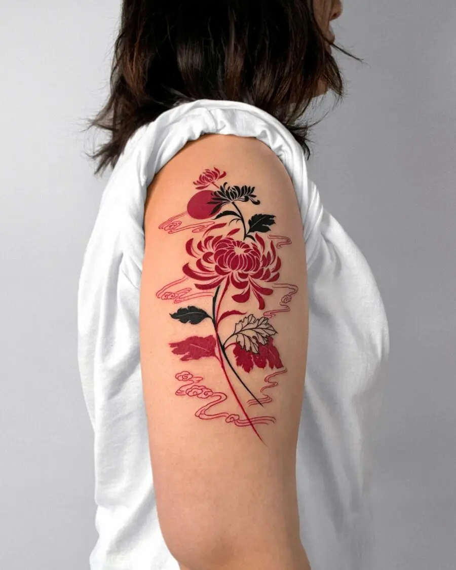 Beautiful red ink floral tattoo on arm