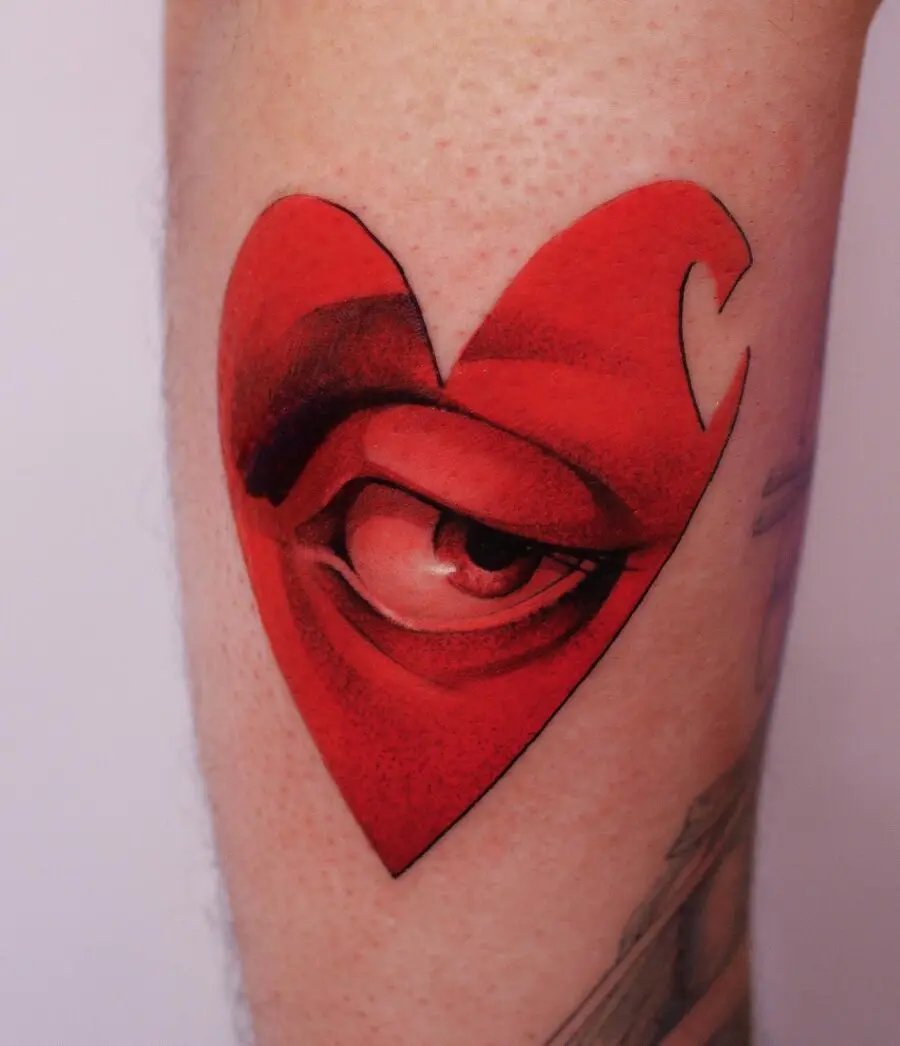 Unique heart-shaped tattoo with an eye design