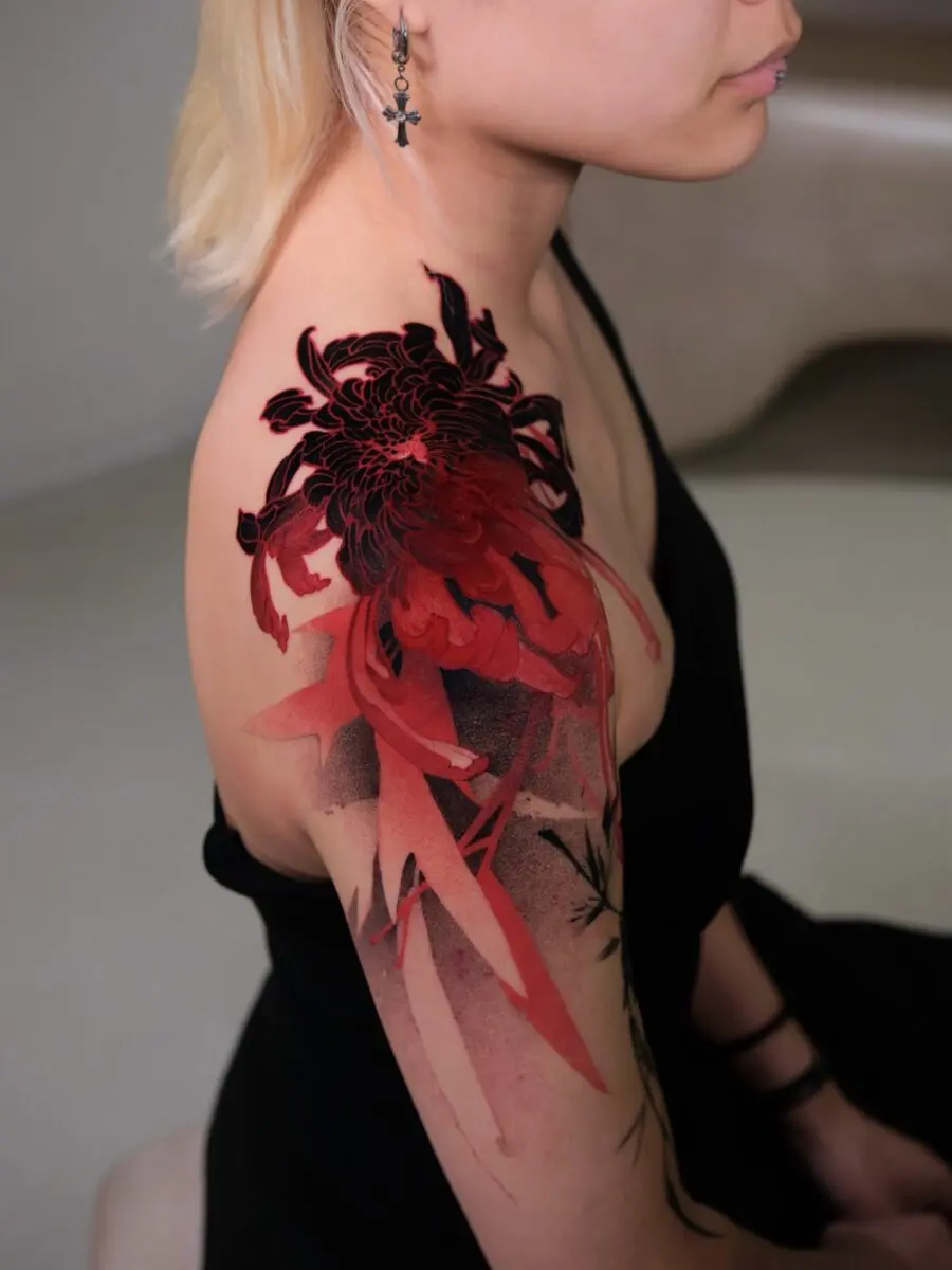 Bold Red Floral Tattoo on Shoulder