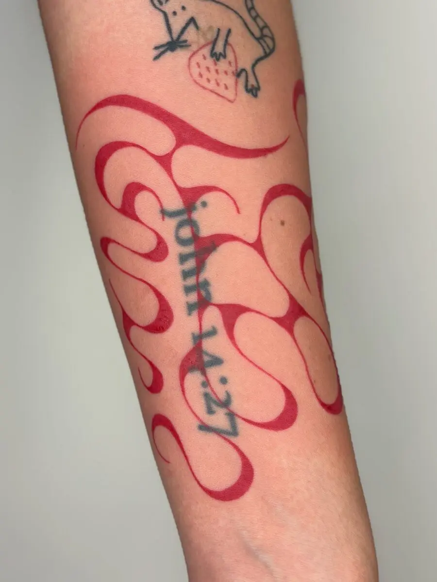 Stylish Red Ink Abstract Tattoo on Forearm