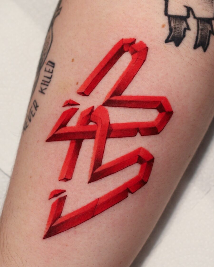 Striking red ink geometric tattoo design.