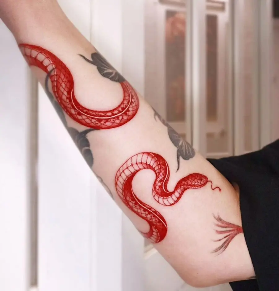 Striking Red Ink Snake Tattoo Design