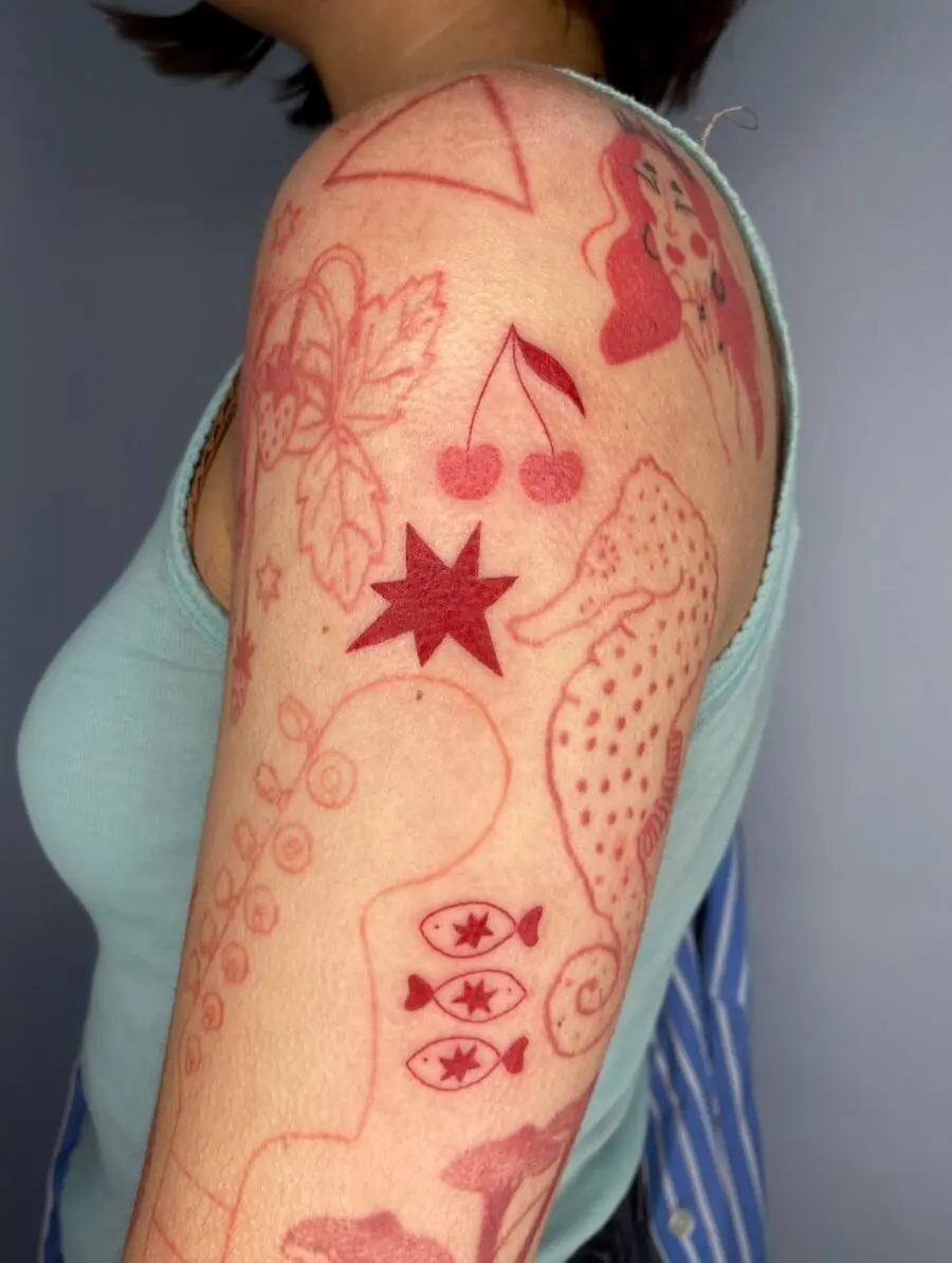 Unique red ink tattoo designs showcasing creativity