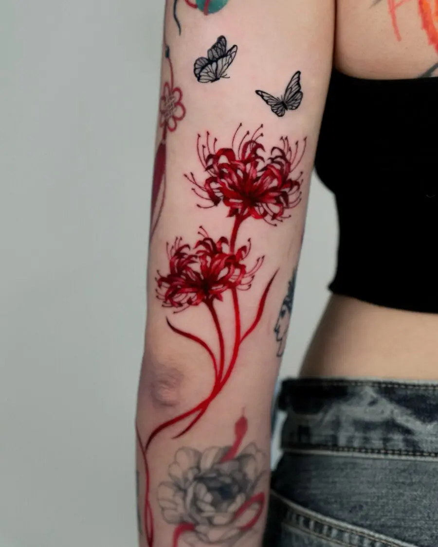 Stunning Red Floral Tattoo Design on Arm