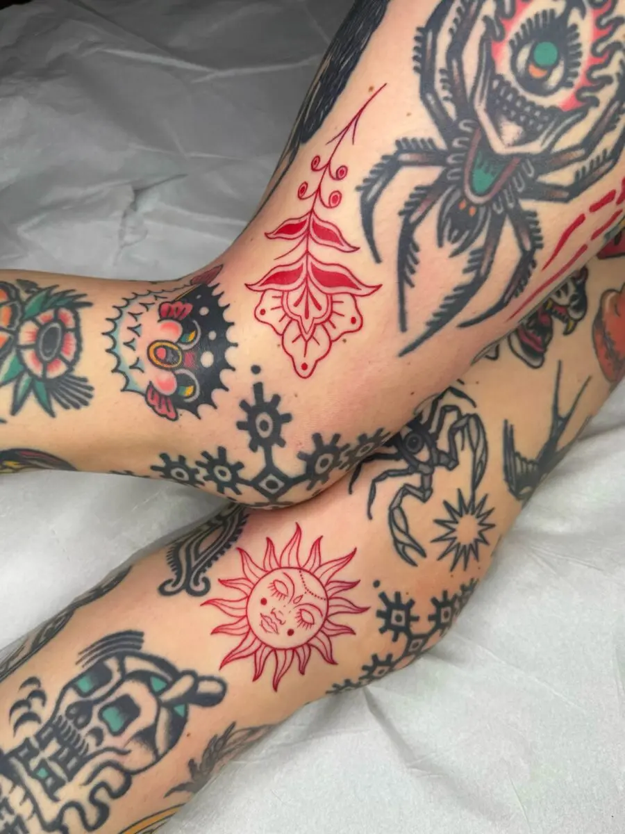 Vibrant red ink tattoos showcasing nature's beauty