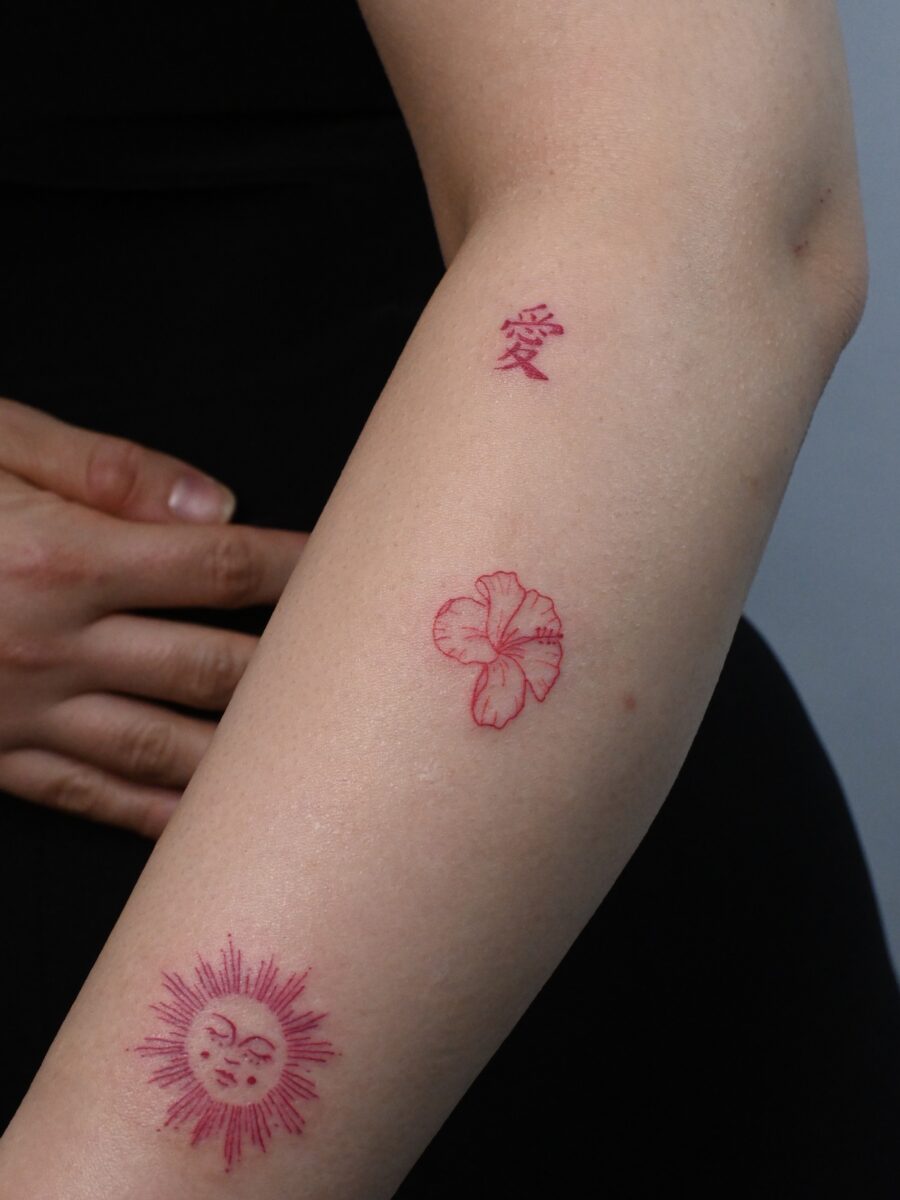 Vibrant red ink tattoo designs showcased here