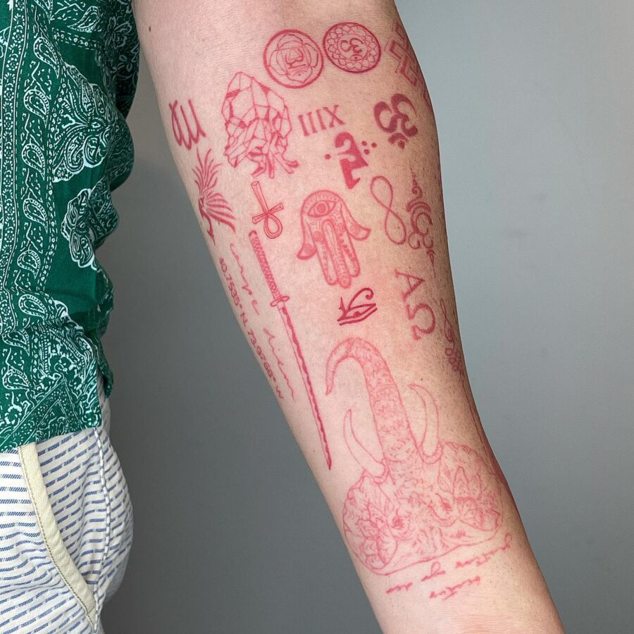 Explore vibrant red ink tattoo artistry today