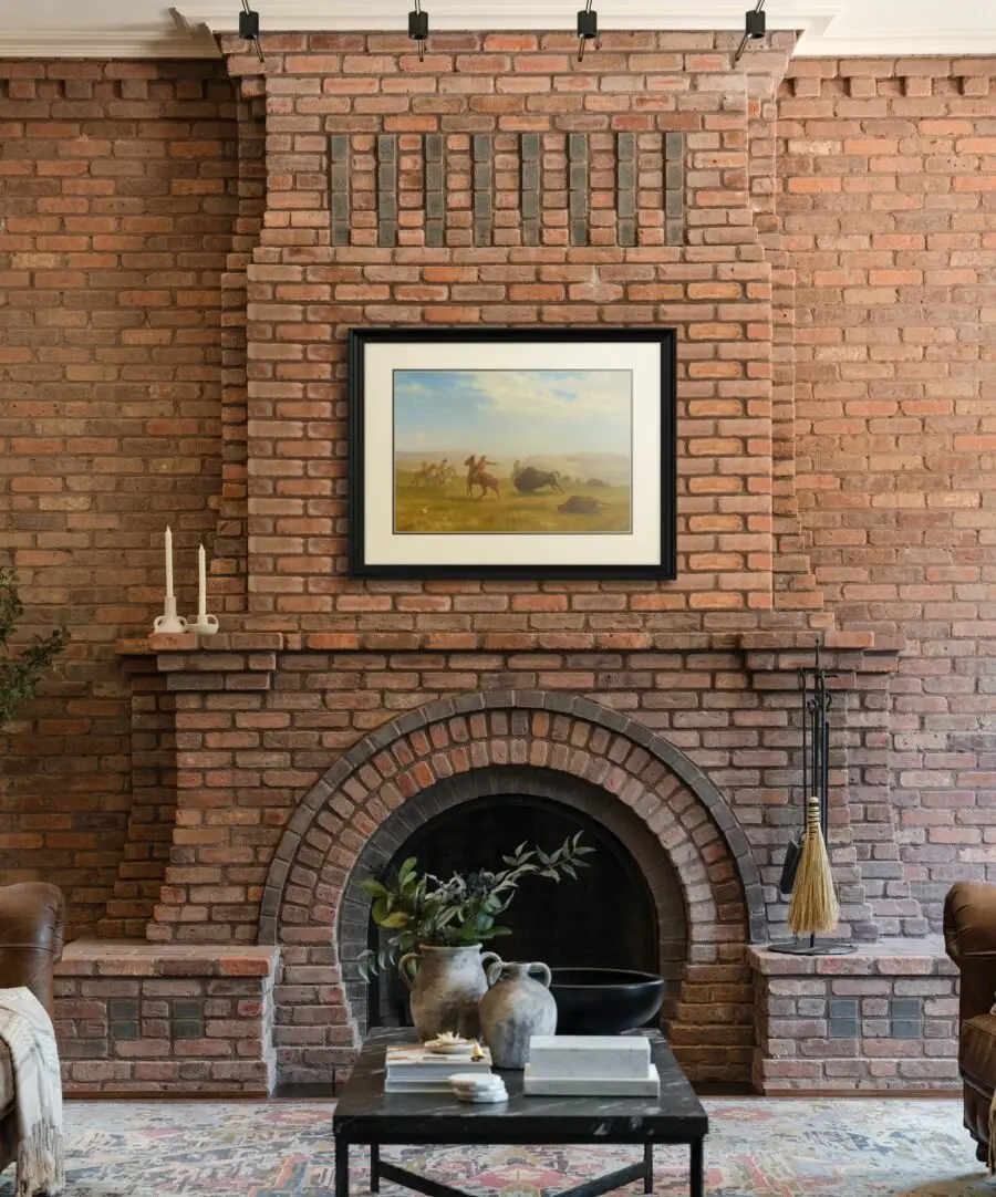 Elegant rustic brick fireplace with charming decor