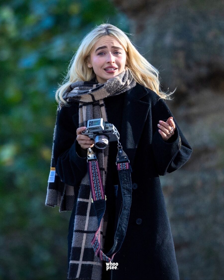 Chic black coat and stylish scarf ensemble