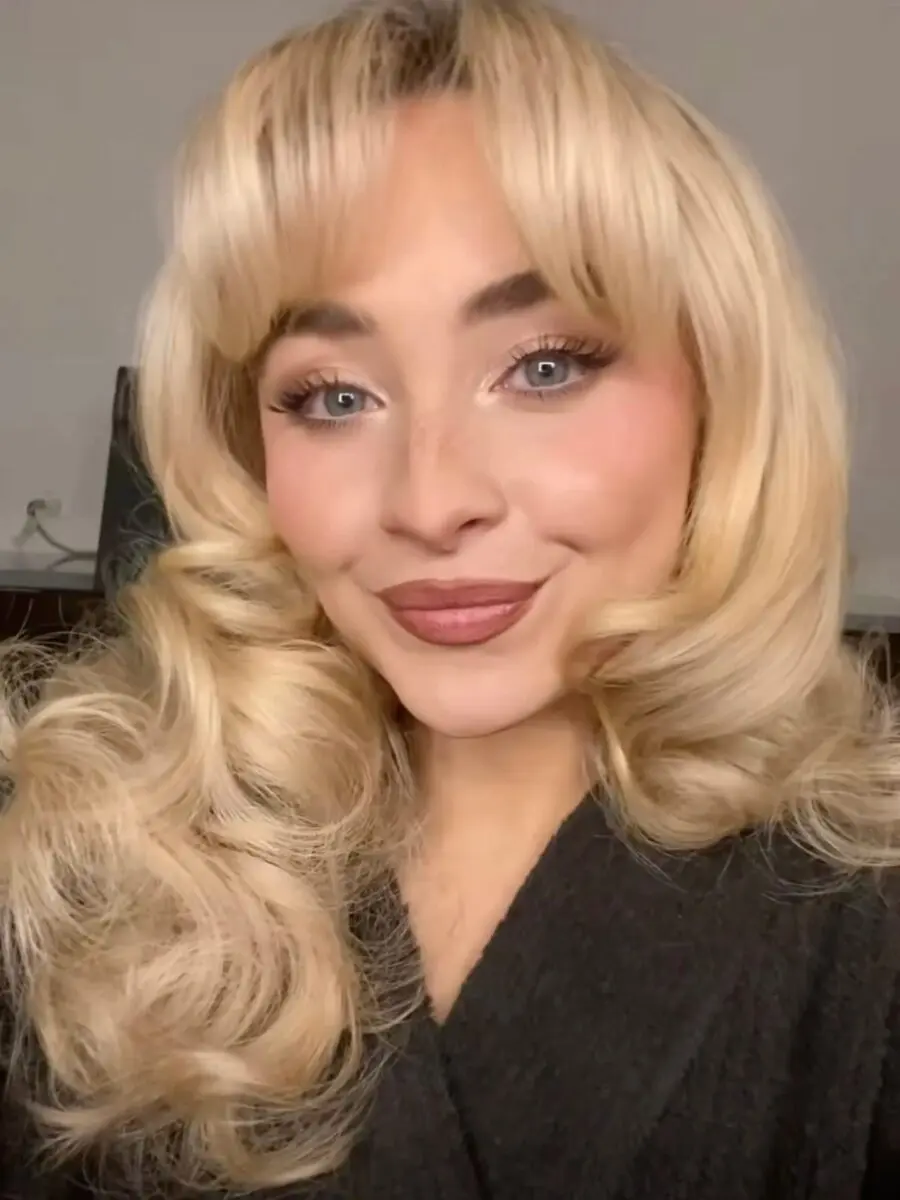 Glamorous blonde beauty with soft glam makeup