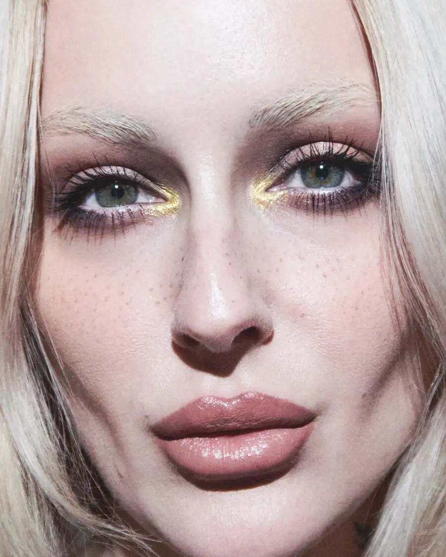 Vibrant yellow accents brighten this glamorous look