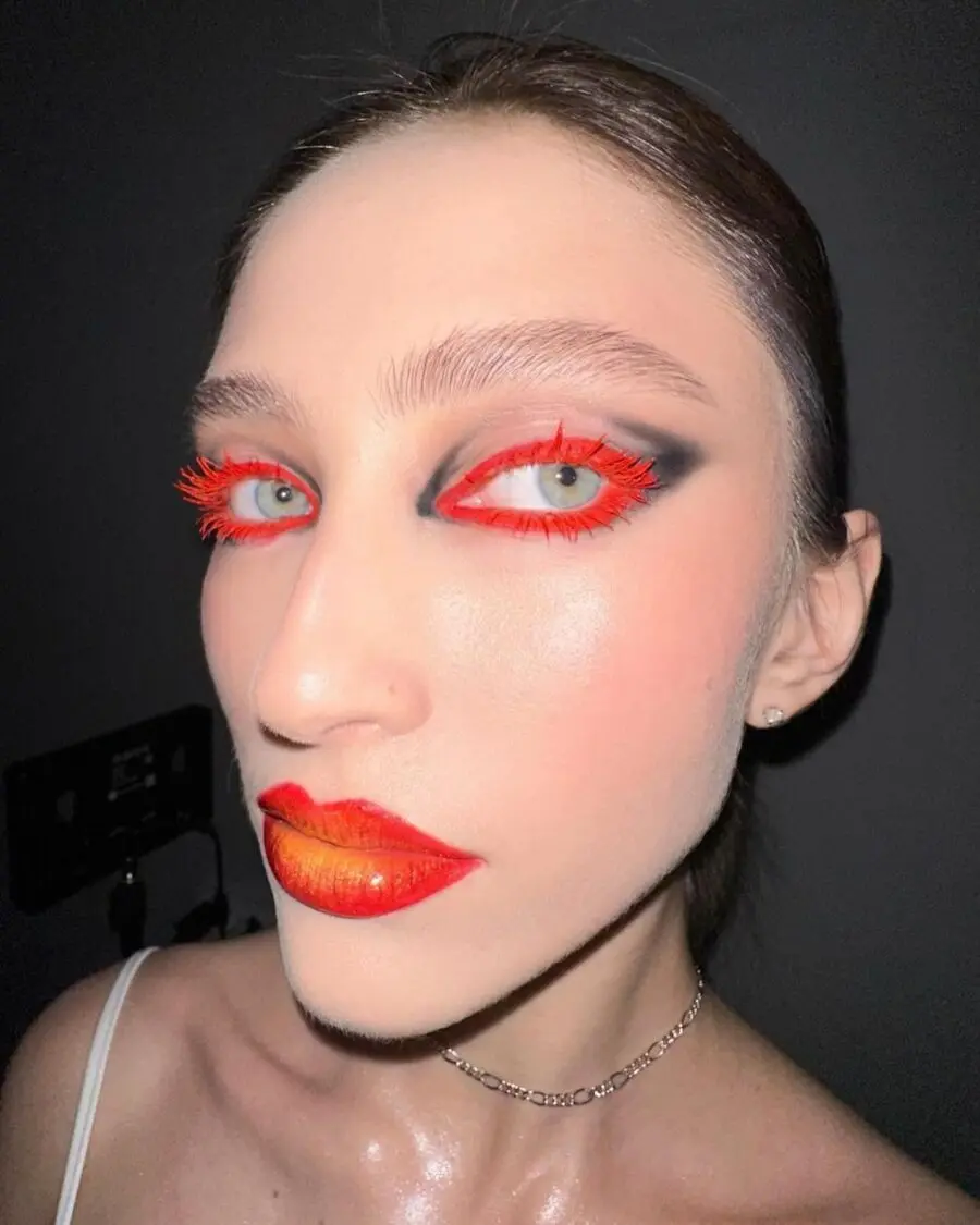 Bold red and black makeup look