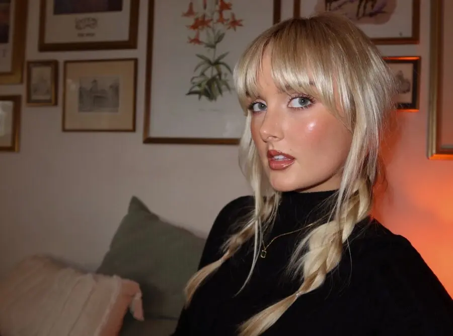 Sleek pigtails with a radiant glow