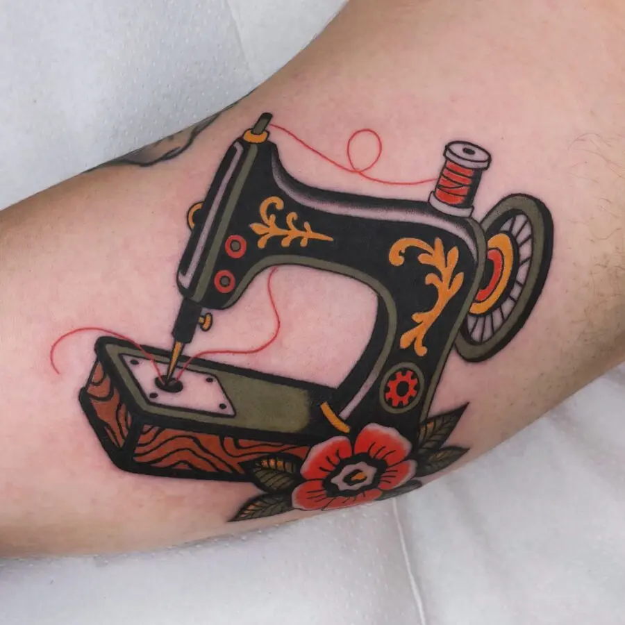 Elegant sewing machine tattoo in neo-traditional style