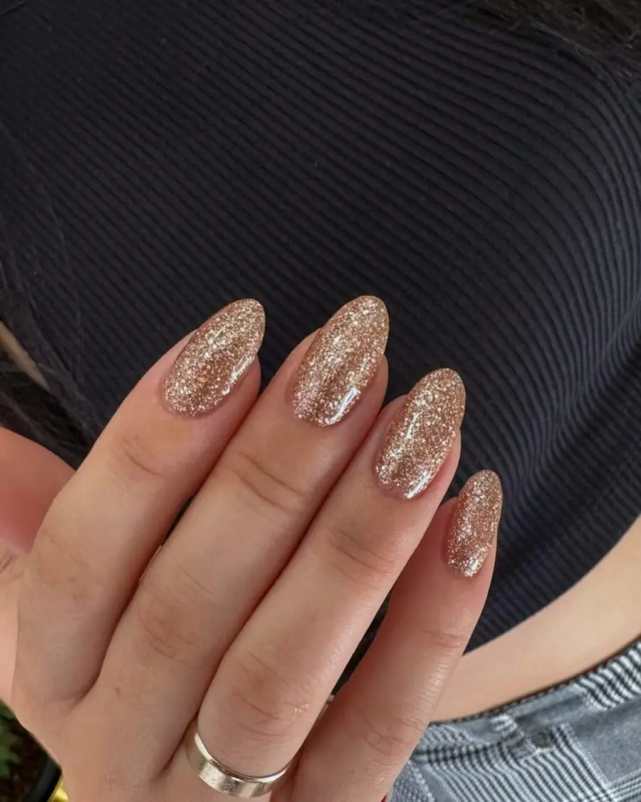 Shimmering Gold Glitter Nails for Glam Look