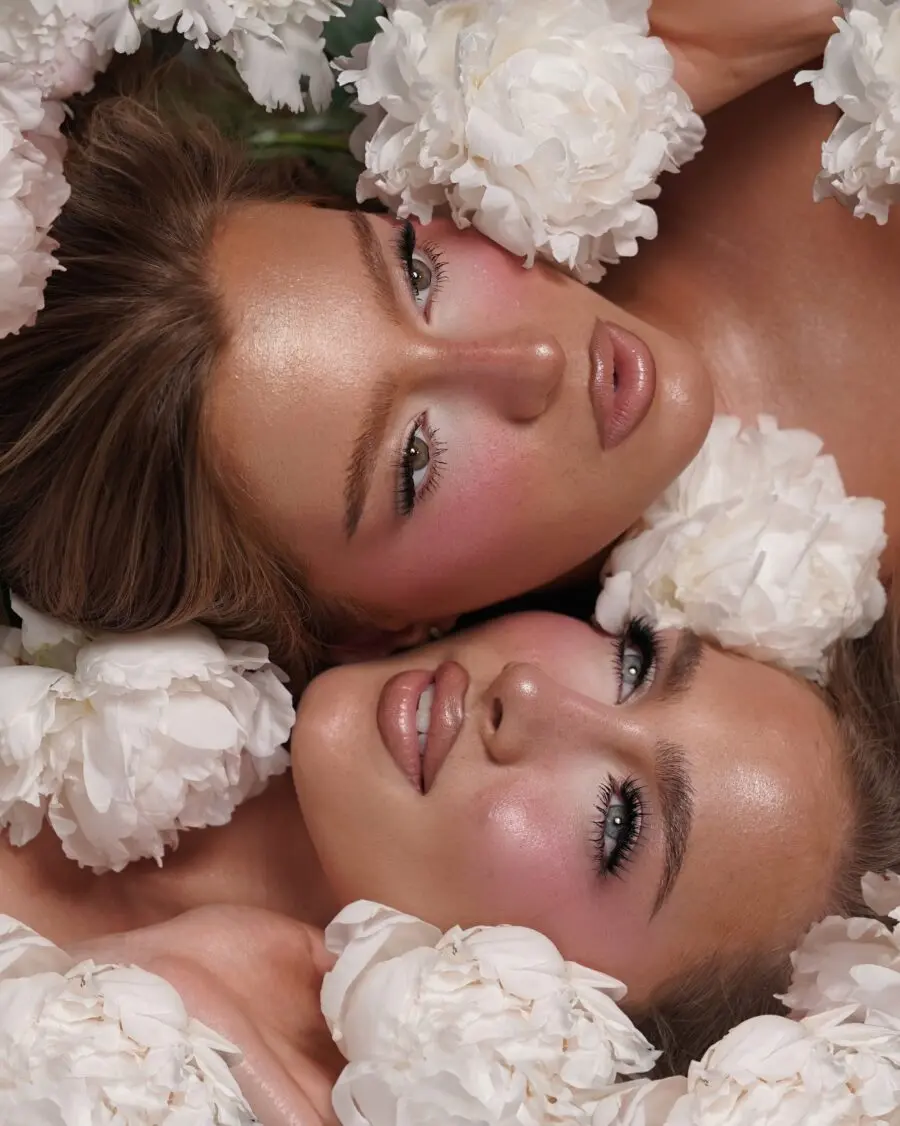 Radiant soft glam with floral accents