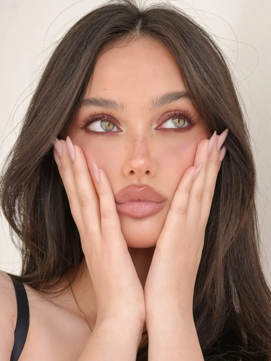 Soft glam makeup enhances natural beauty effortlessly.