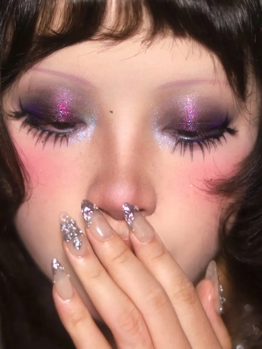 Glamorous glittery eye makeup with pastel accents