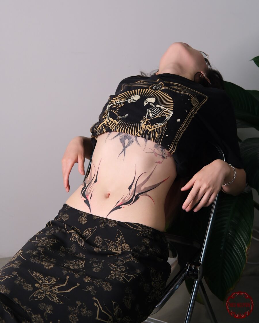 Elegant Abstract Stomach Tattoo Showcase