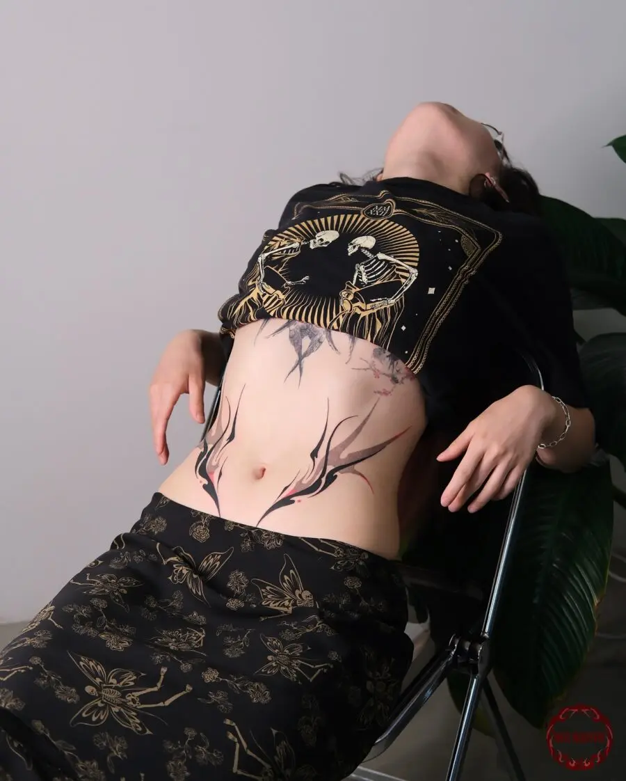 Elegant Abstract Stomach Tattoo Showcase