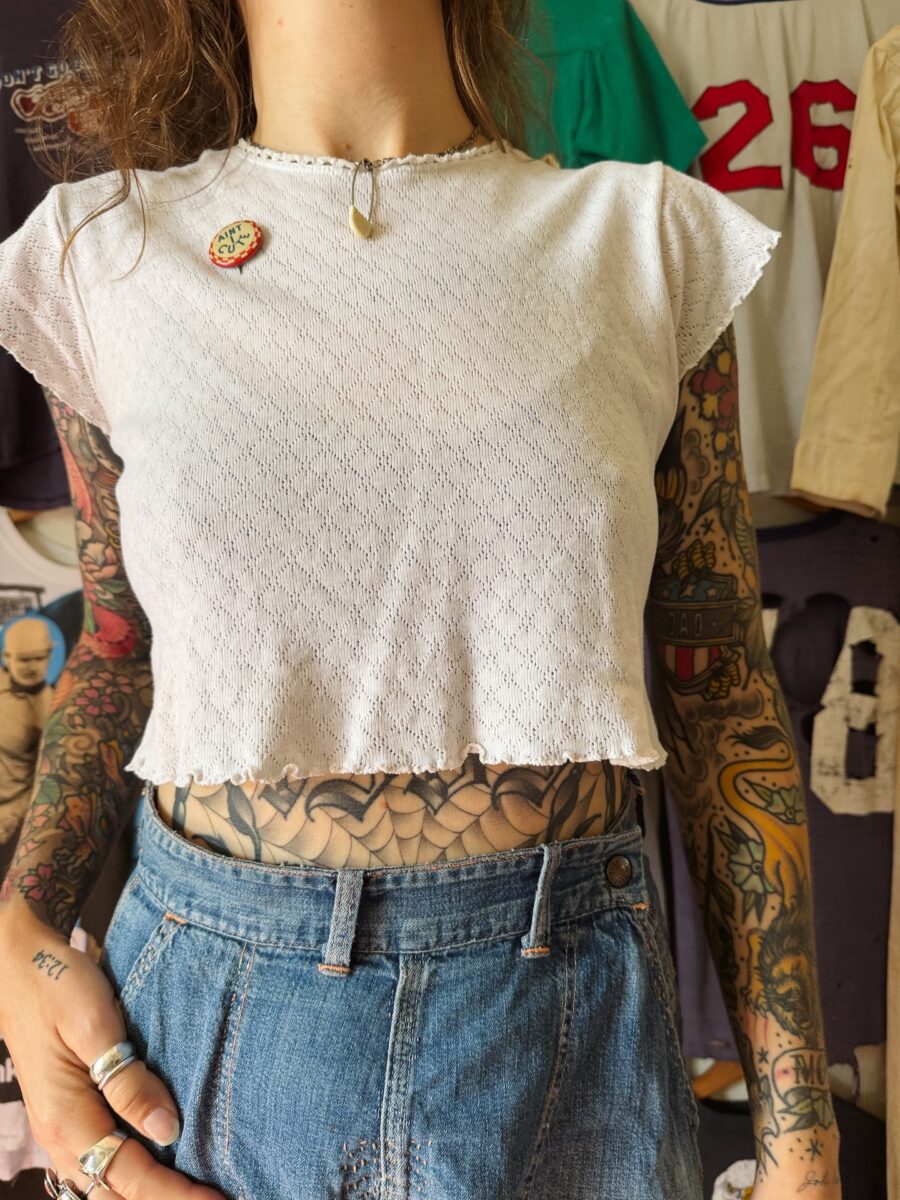 Unique stomach tattoo showcasing artistry and fashion