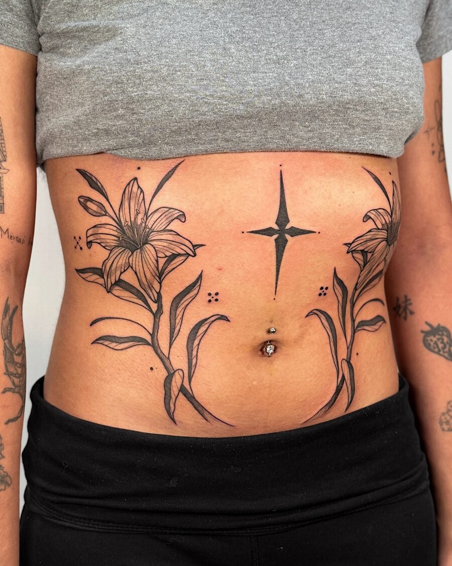 Intricate Floral Stomach Tattoo Design