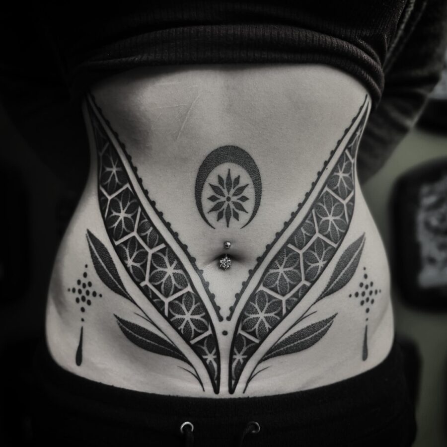 Intricate floral design on the stomach